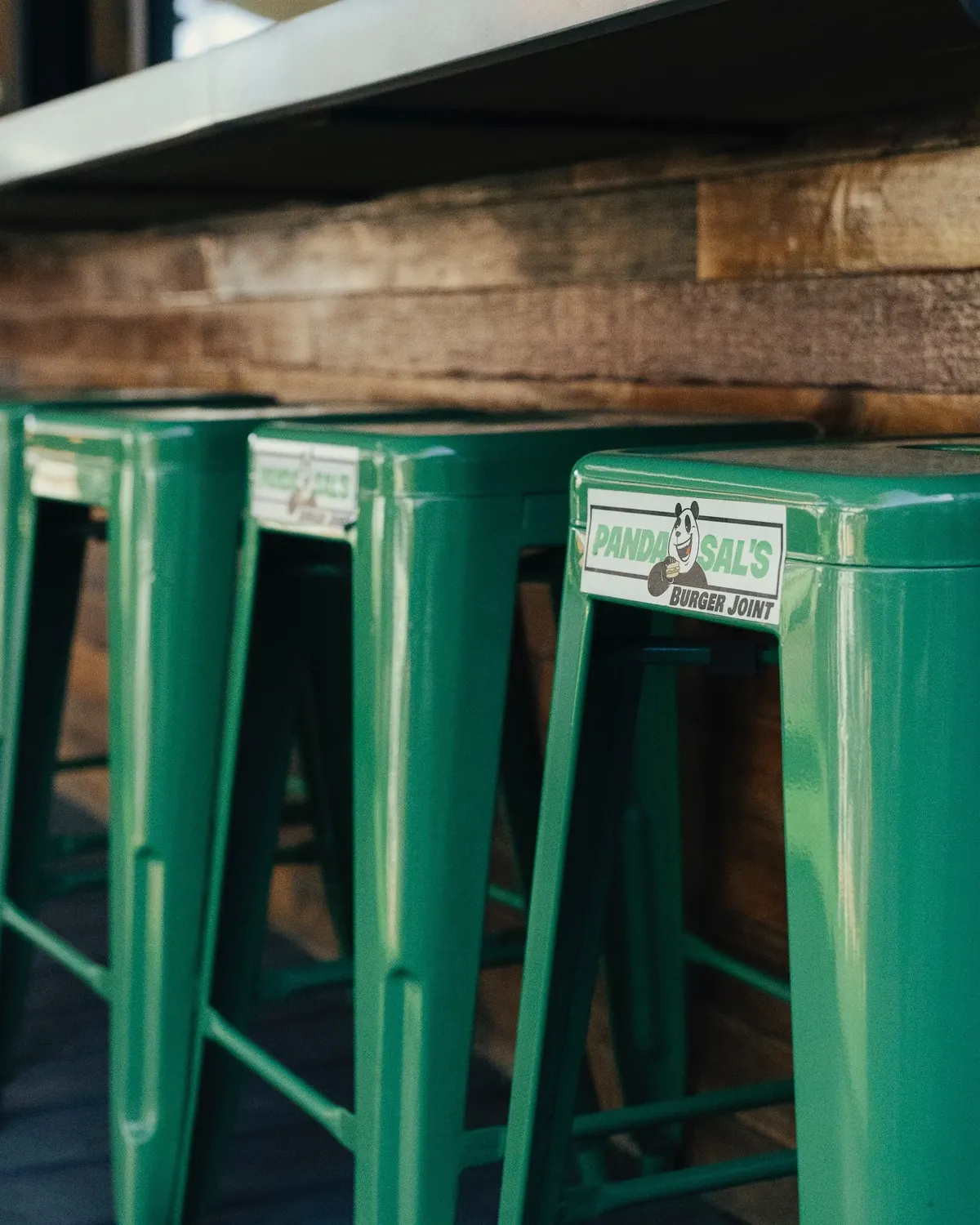 Pan Da Sal's green stools at the Bellflower location